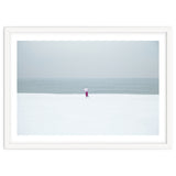A walking woman in the winter snow beach thumbnail