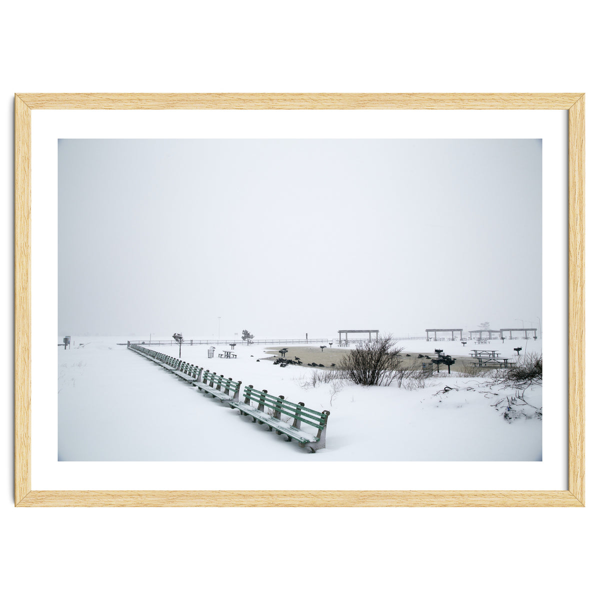 No people on a bench in the snowy winter