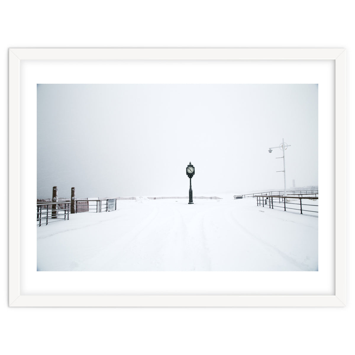 A clock tower in the snow beach