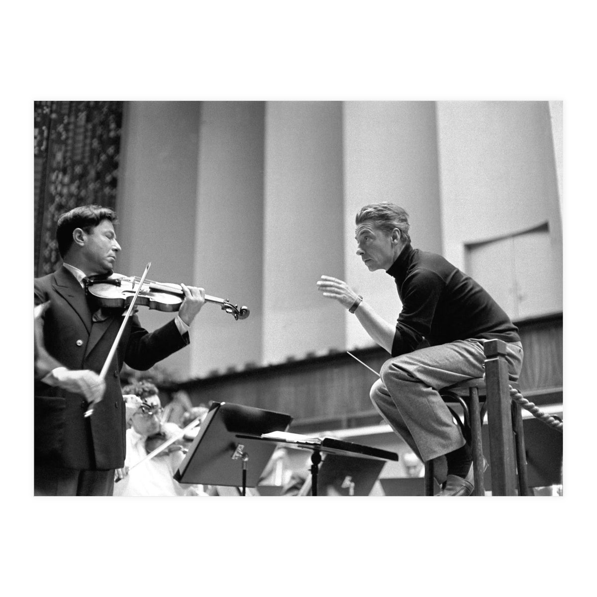 Conductor Herbert von Karajan rehearsing with Nathan Milstein in Lucerne, Switzerland. Lucerne,1957. (Print Only)
