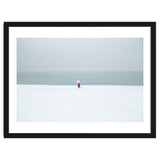 A walking woman in the winter snow beach thumbnail