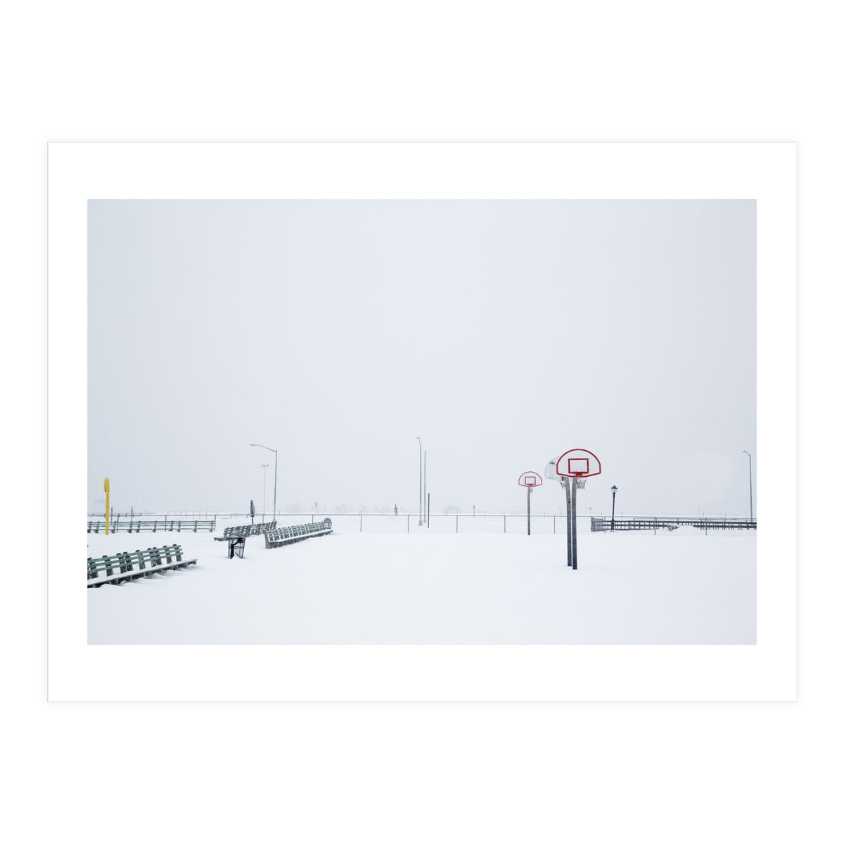 Snow-covered Basketball court and side bench (Print Only)