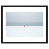 A walking woman in the winter snow beach thumbnail