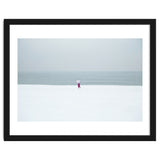 A walking woman in the winter snow beach thumbnail