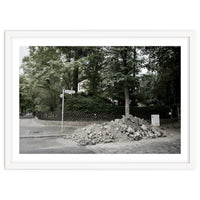 Piled-up rocks under construction on the street