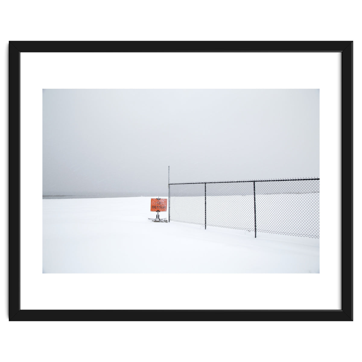 Detour sign in the snow beach