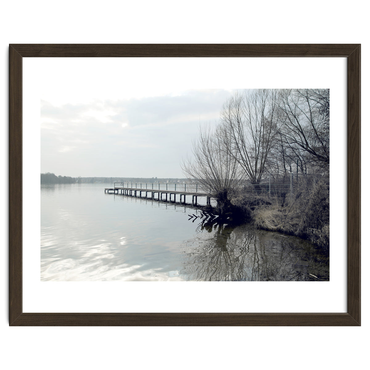 Sunny day pier in the lake