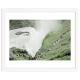 Tourists walking around the waterfall - Iceland thumbnail