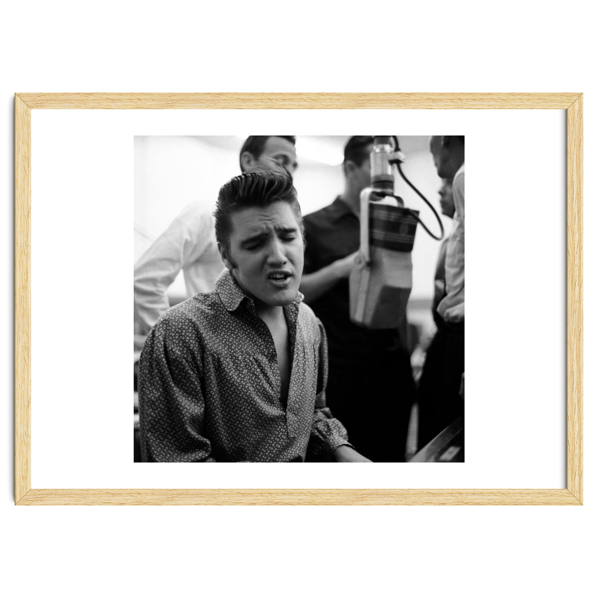 The American singer Elvis Presley during a recording session in 1956.