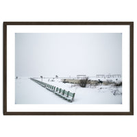 No people on a bench in the snowy winter