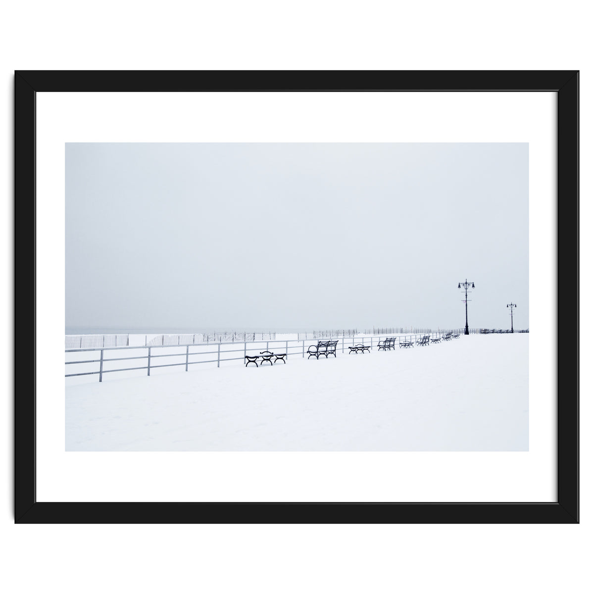 Benches along the pier on snow beach