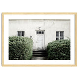 White door K between the green botanical gate thumbnail