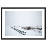 No people on a bench in the snowy winter