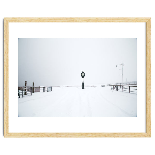 A clock tower in the snow beach