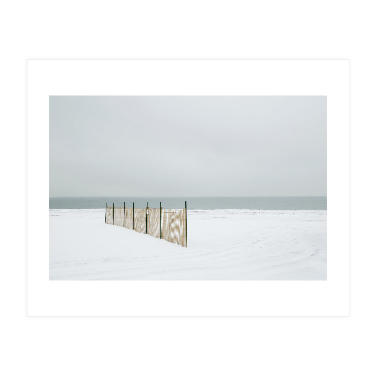 Wood fence in the winter snow beach (Print Only)