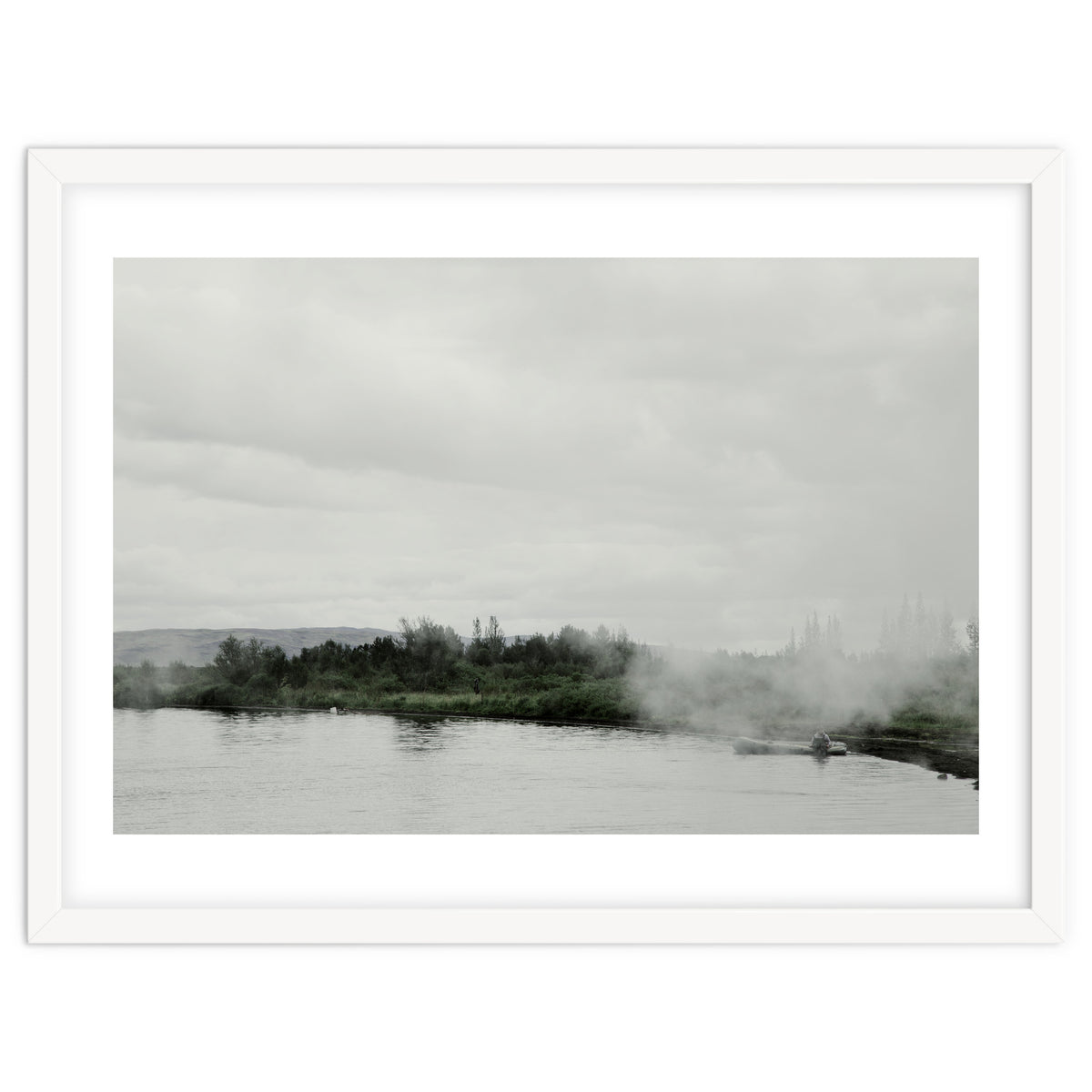 A boy on the boat in the geothermal lake - Iceland