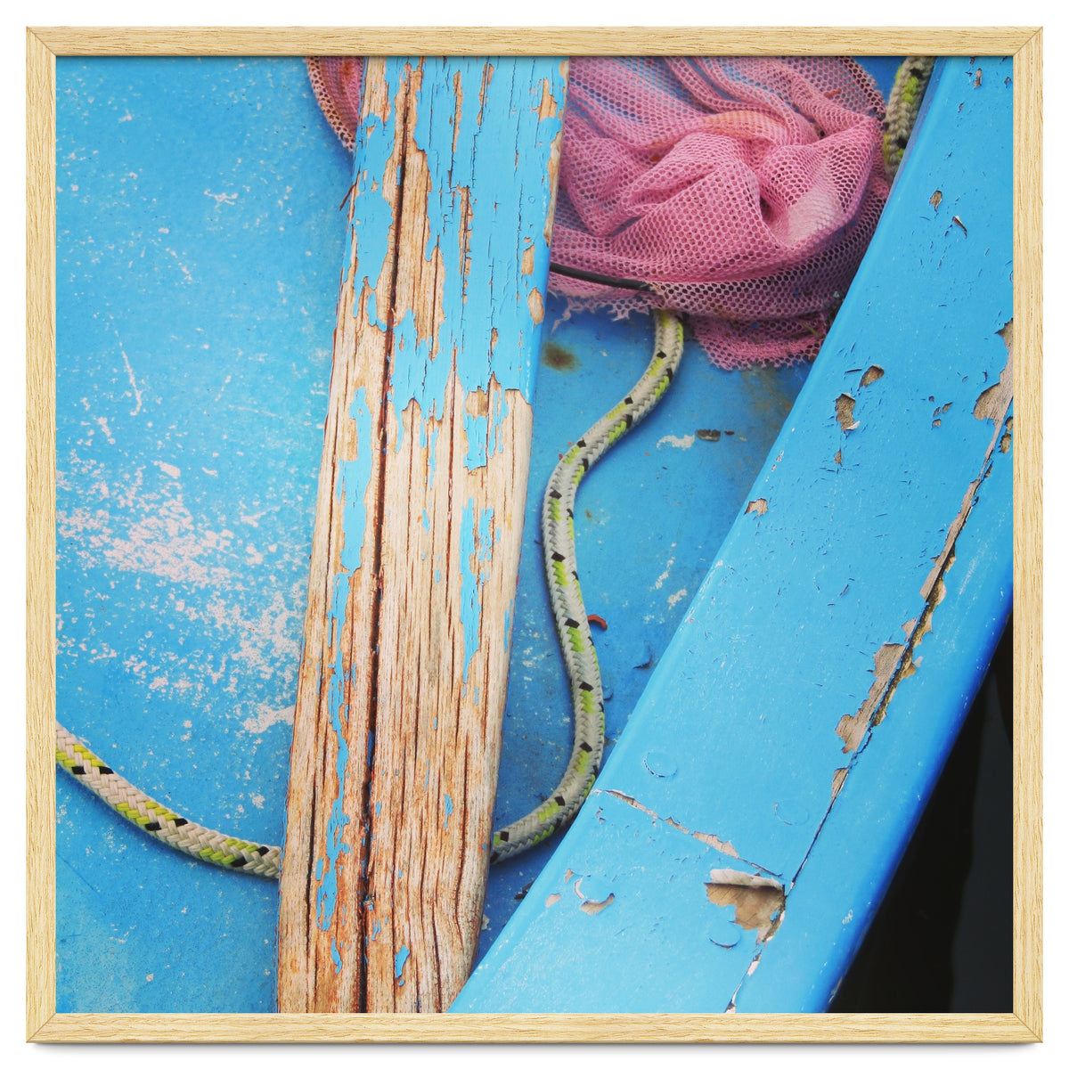 Weathered boat, sail and oar
