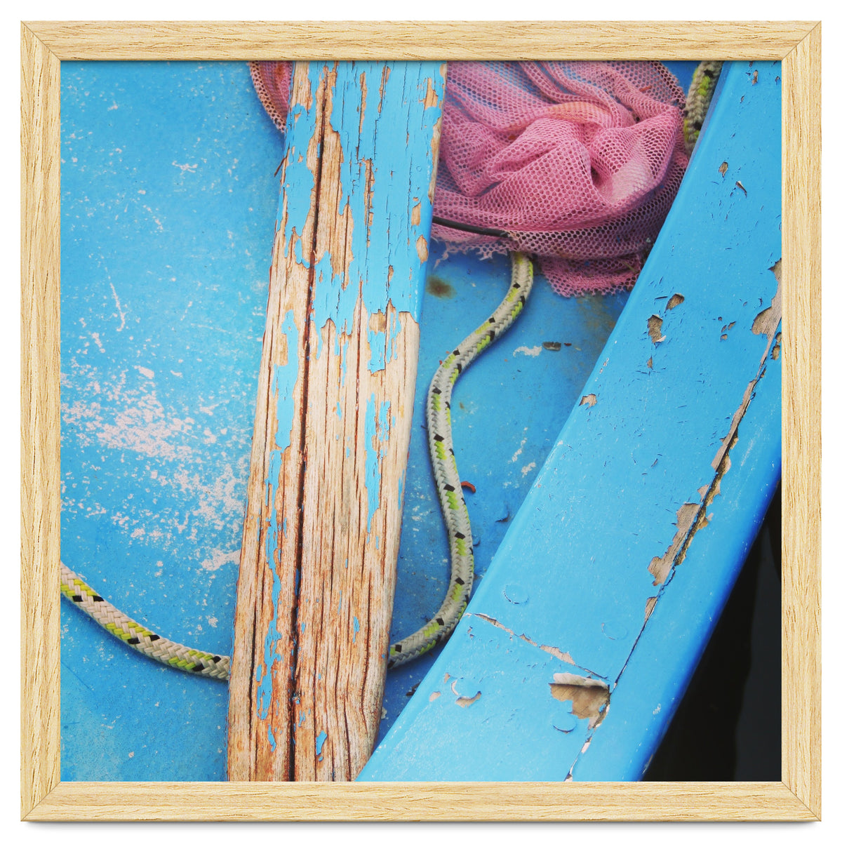 Weathered boat, sail and oar
