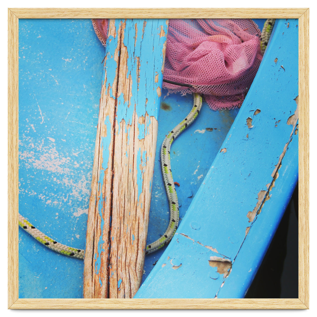 Weathered boat, sail and oar