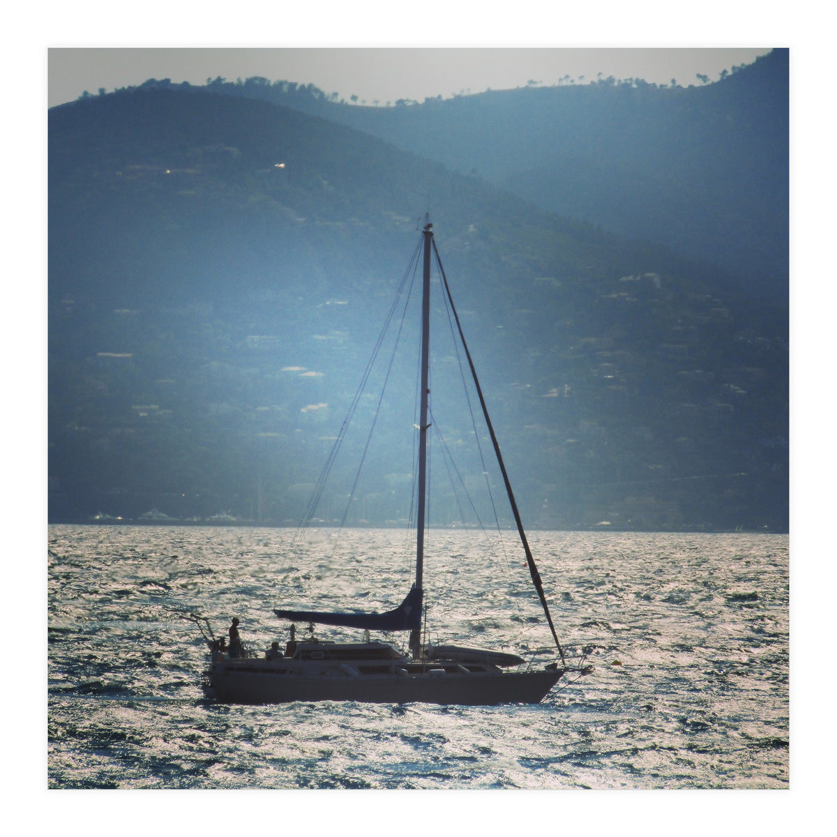 Sailing boat at sunset (Print Only)