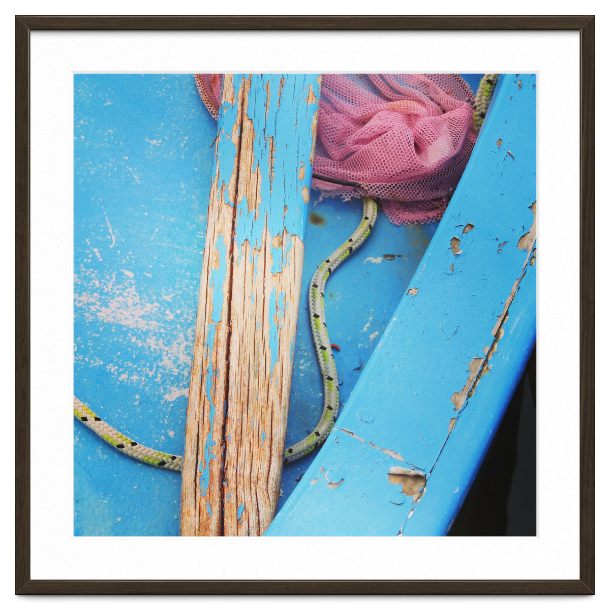 Weathered boat, sail and oar