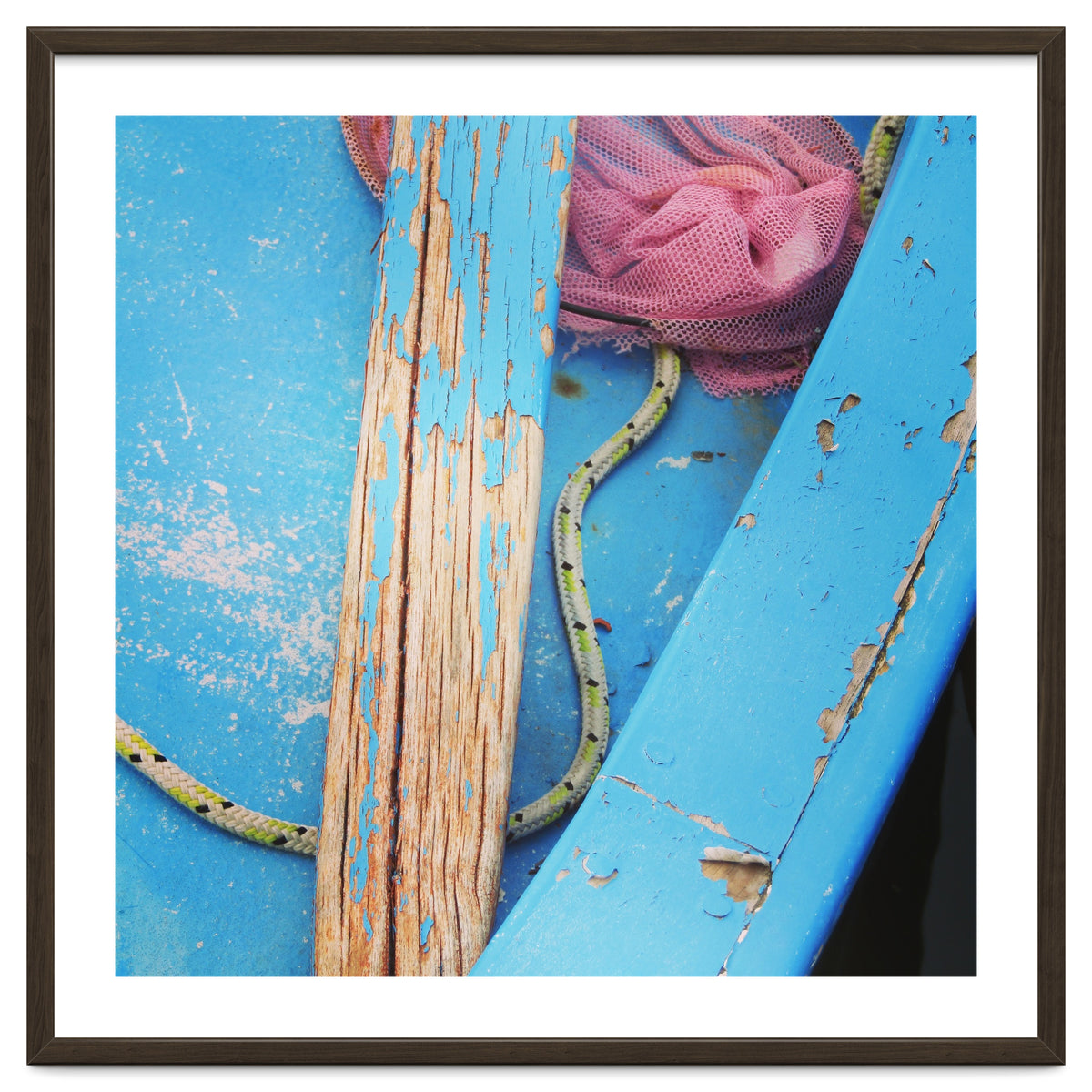 Weathered boat, sail and oar