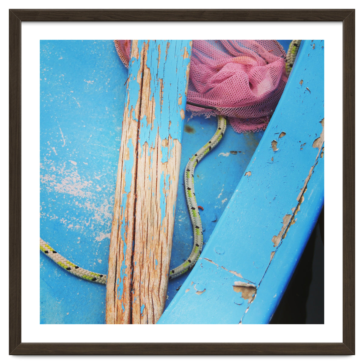 Weathered boat, sail and oar