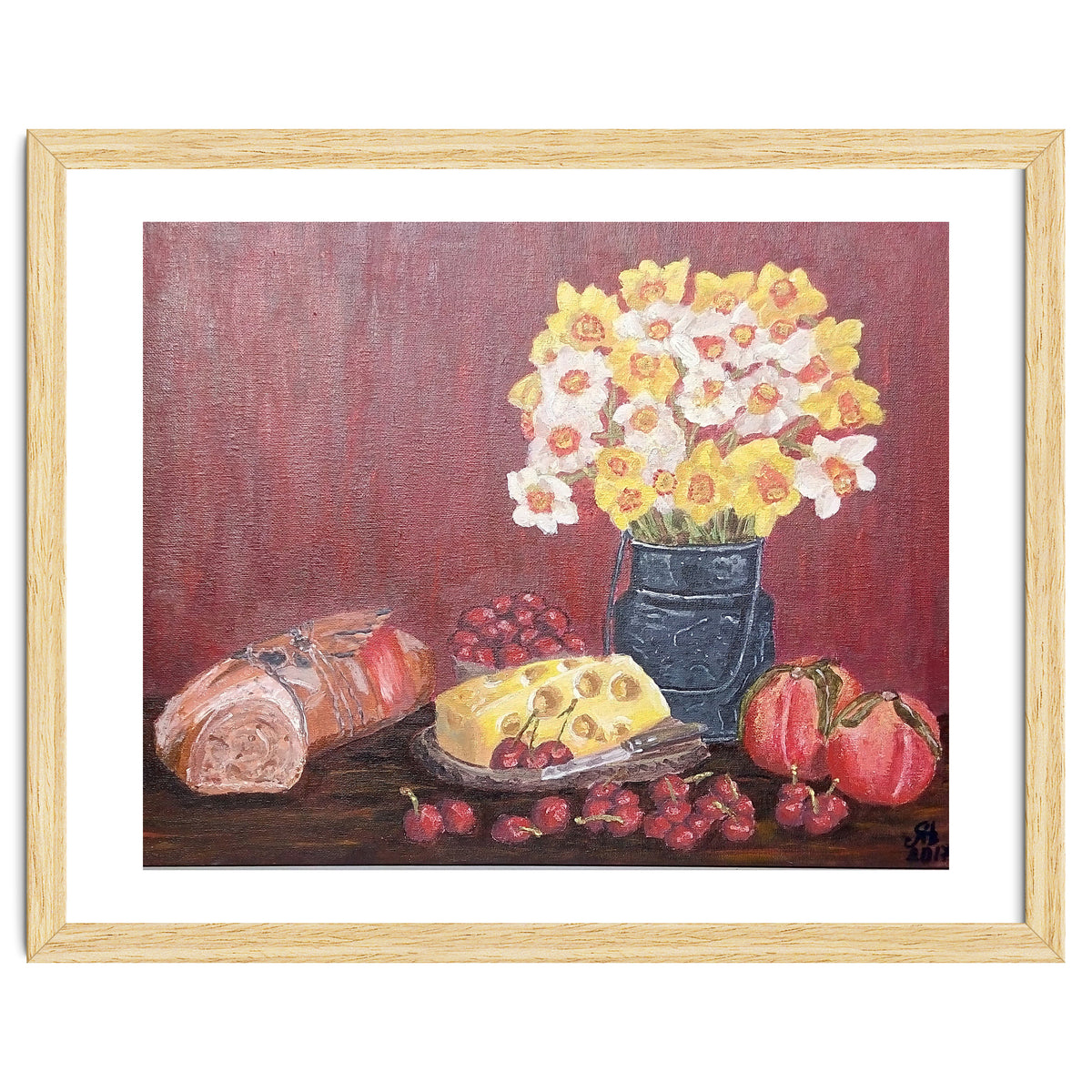 Still life with cheese, daffodils on a red background.