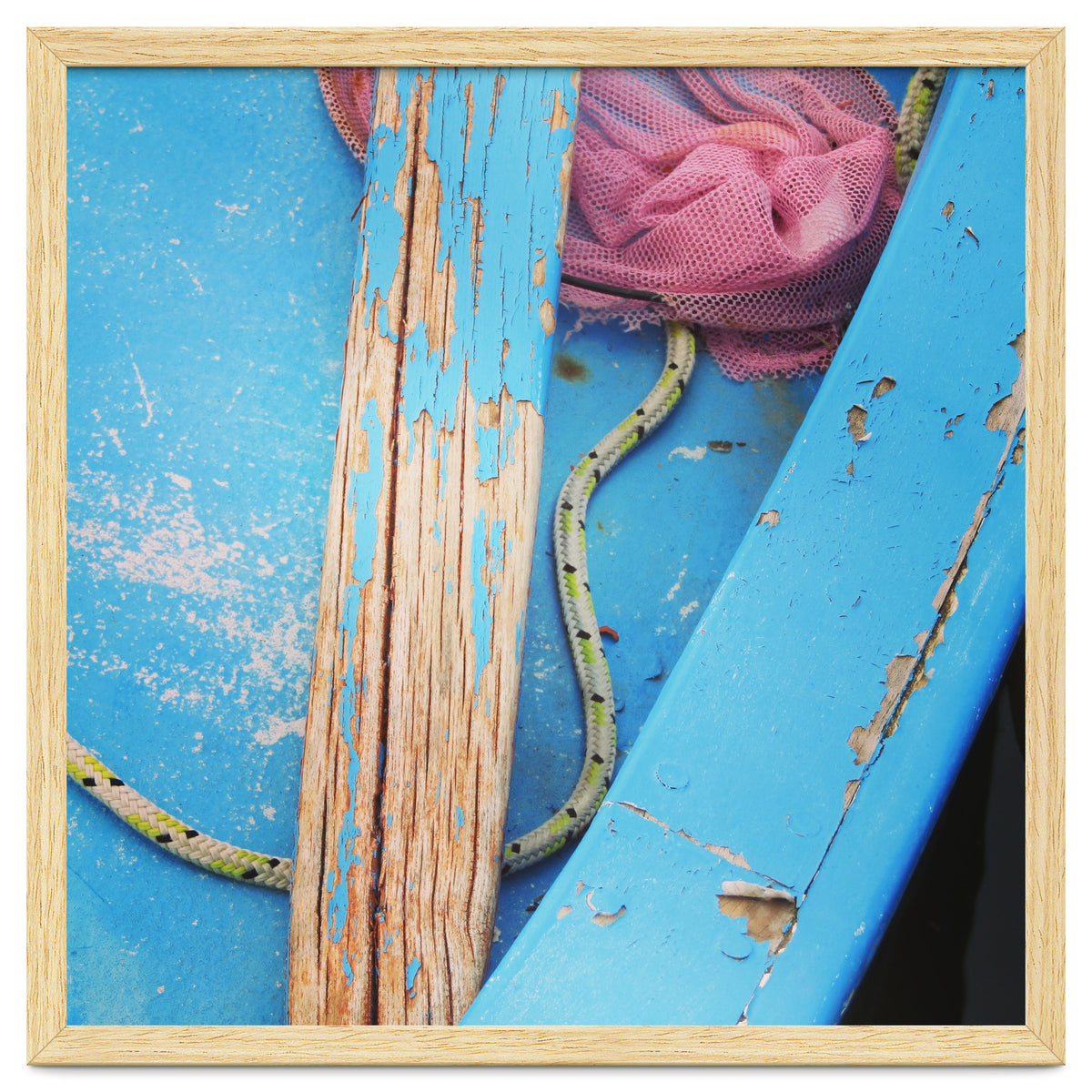 Weathered boat, sail and oar