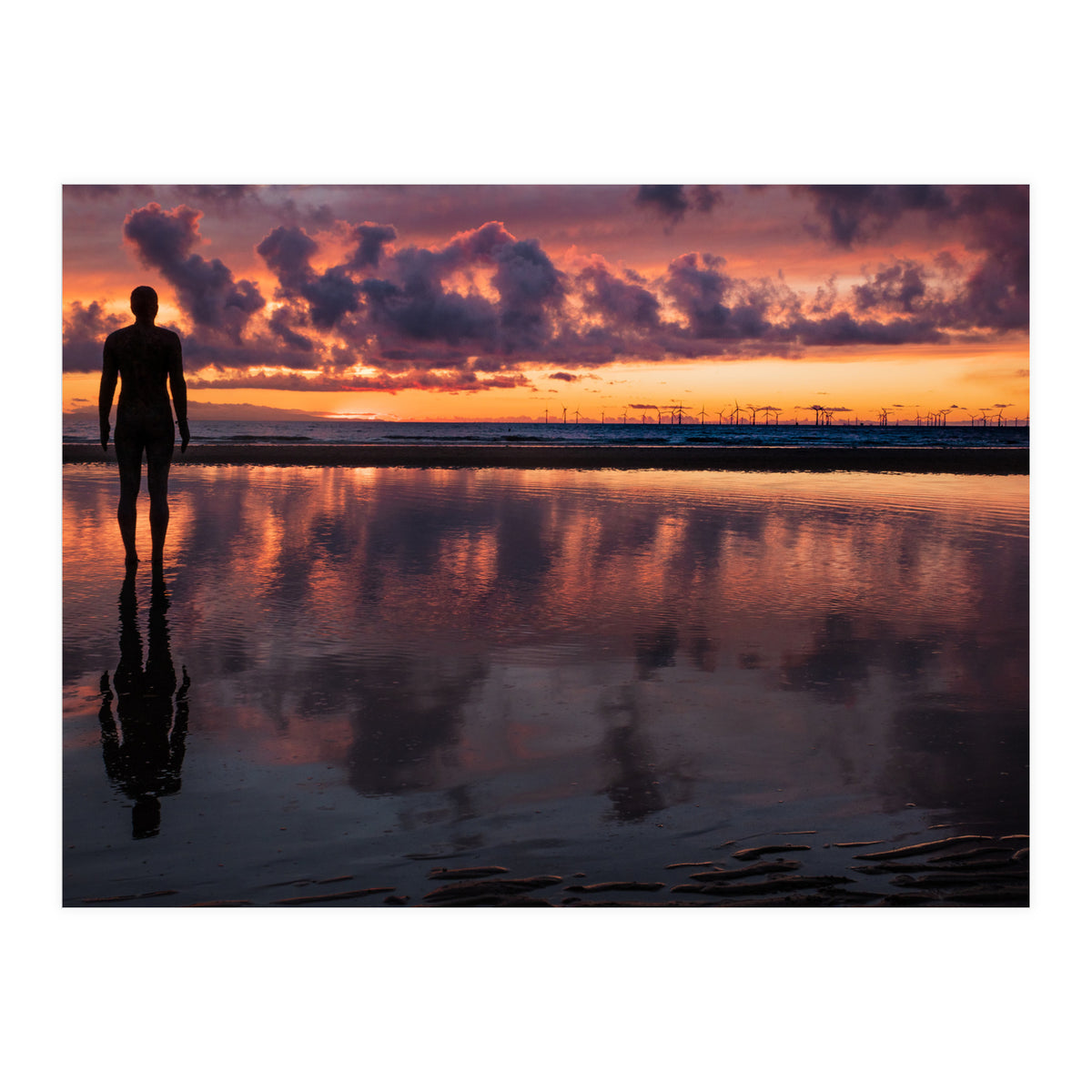 Sunset at Another Place - Sir Antony Gormley statues at Crosby Beach in Merseyside, England.  (Print Only)