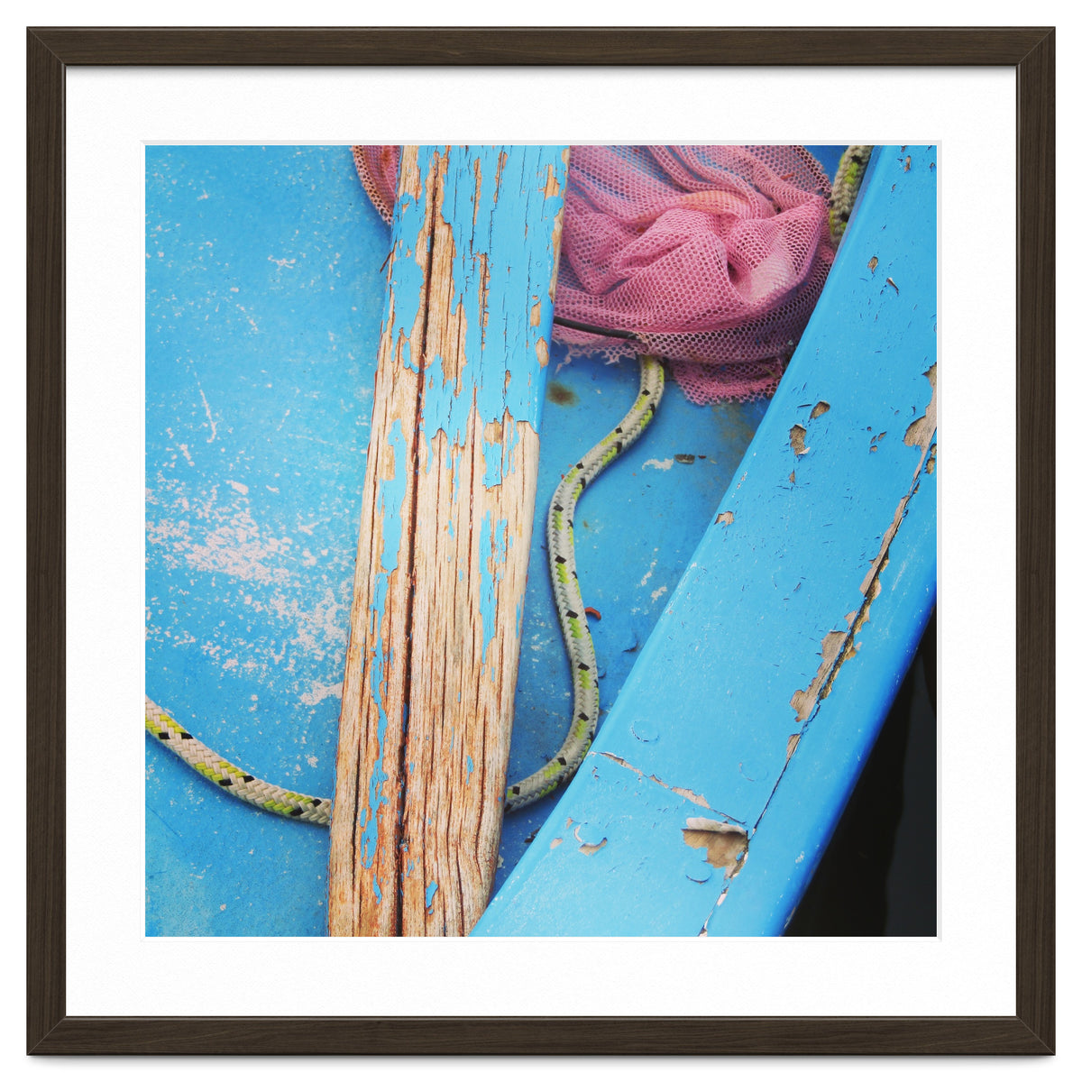 Weathered boat, sail and oar