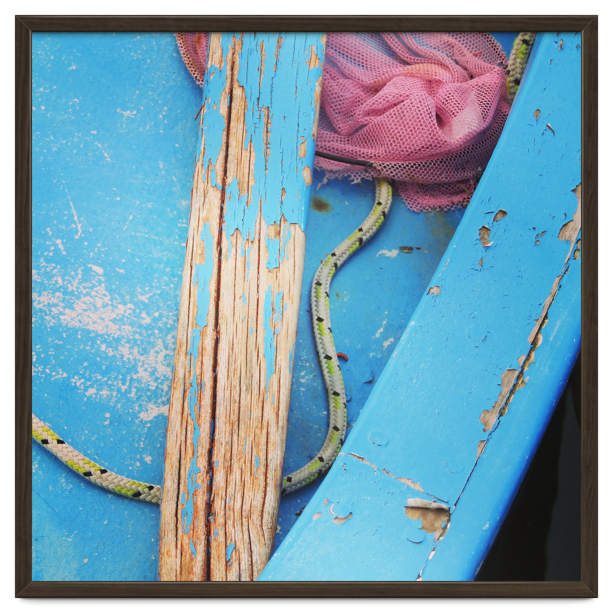 Weathered boat, sail and oar