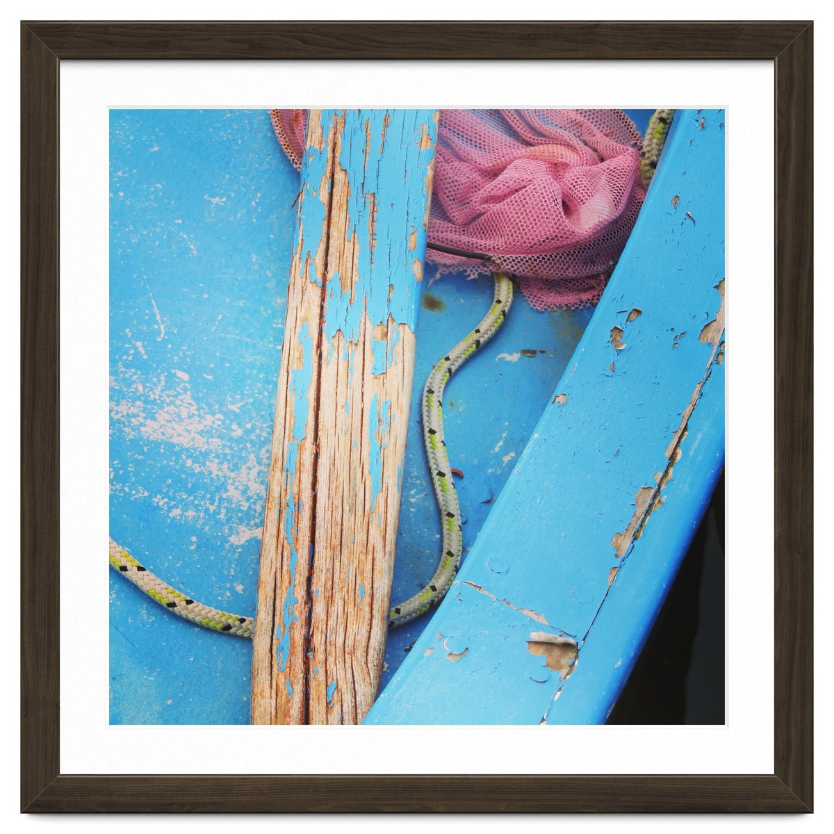Weathered boat, sail and oar