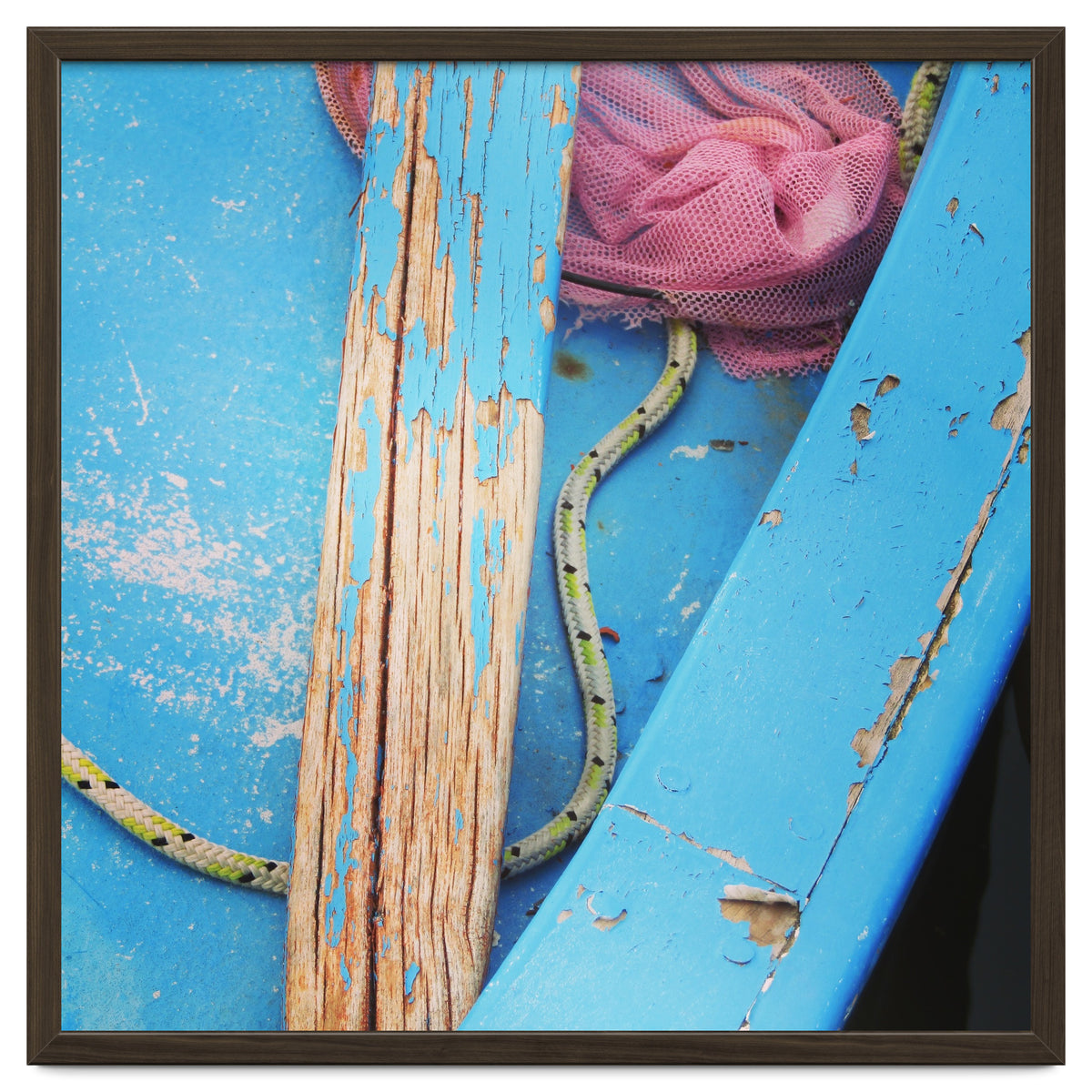 Weathered boat, sail and oar