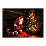 Santa Claus put his Christmas gift under the Xmas tree at midnight (Print Only) thumbnail
