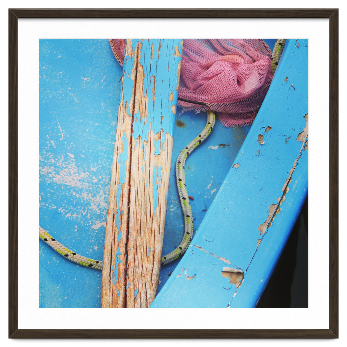 Weathered boat, sail and oar