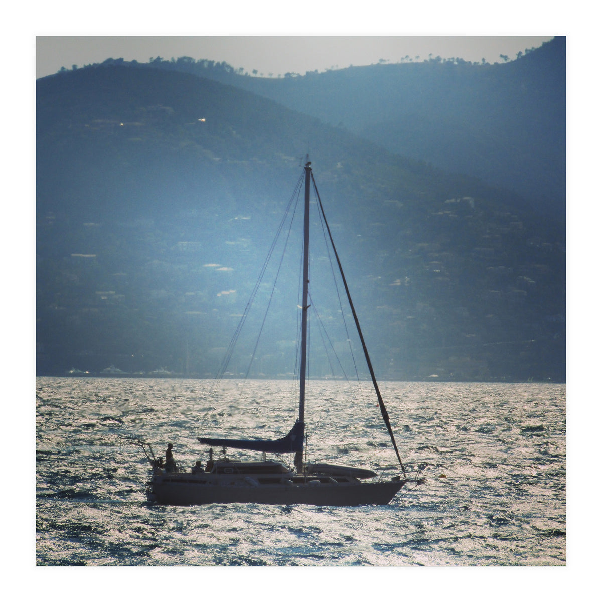 Sailing boat at sunset (Print Only)
