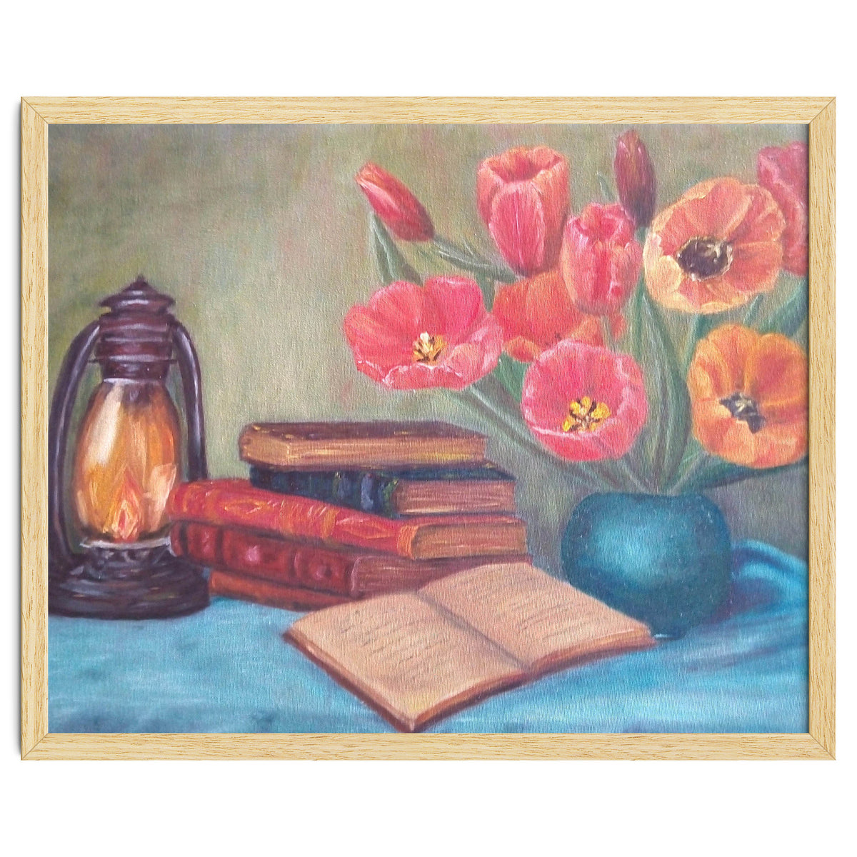 Still life with tulips, books and an old lamp.
