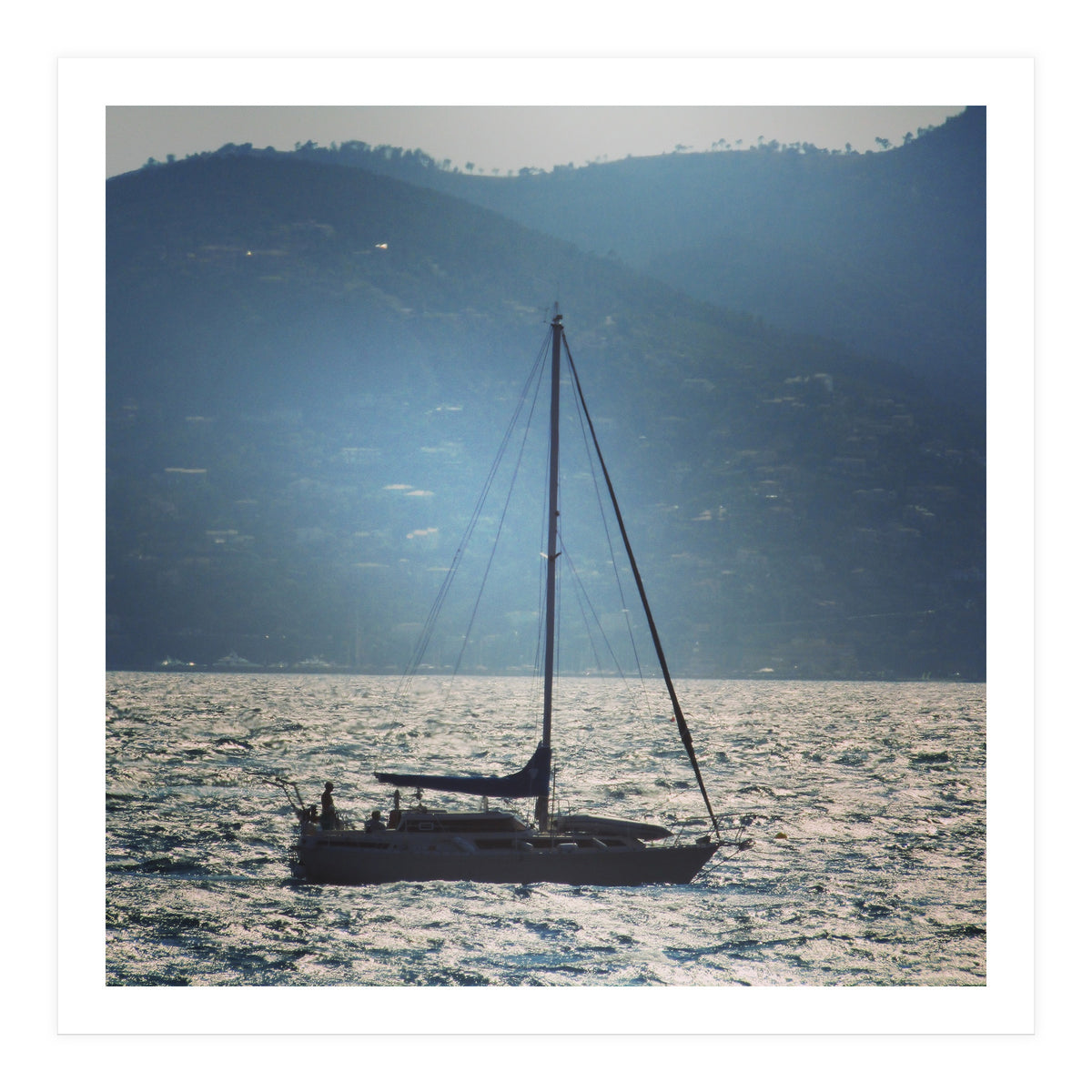 Sailing boat at sunset (Print Only)