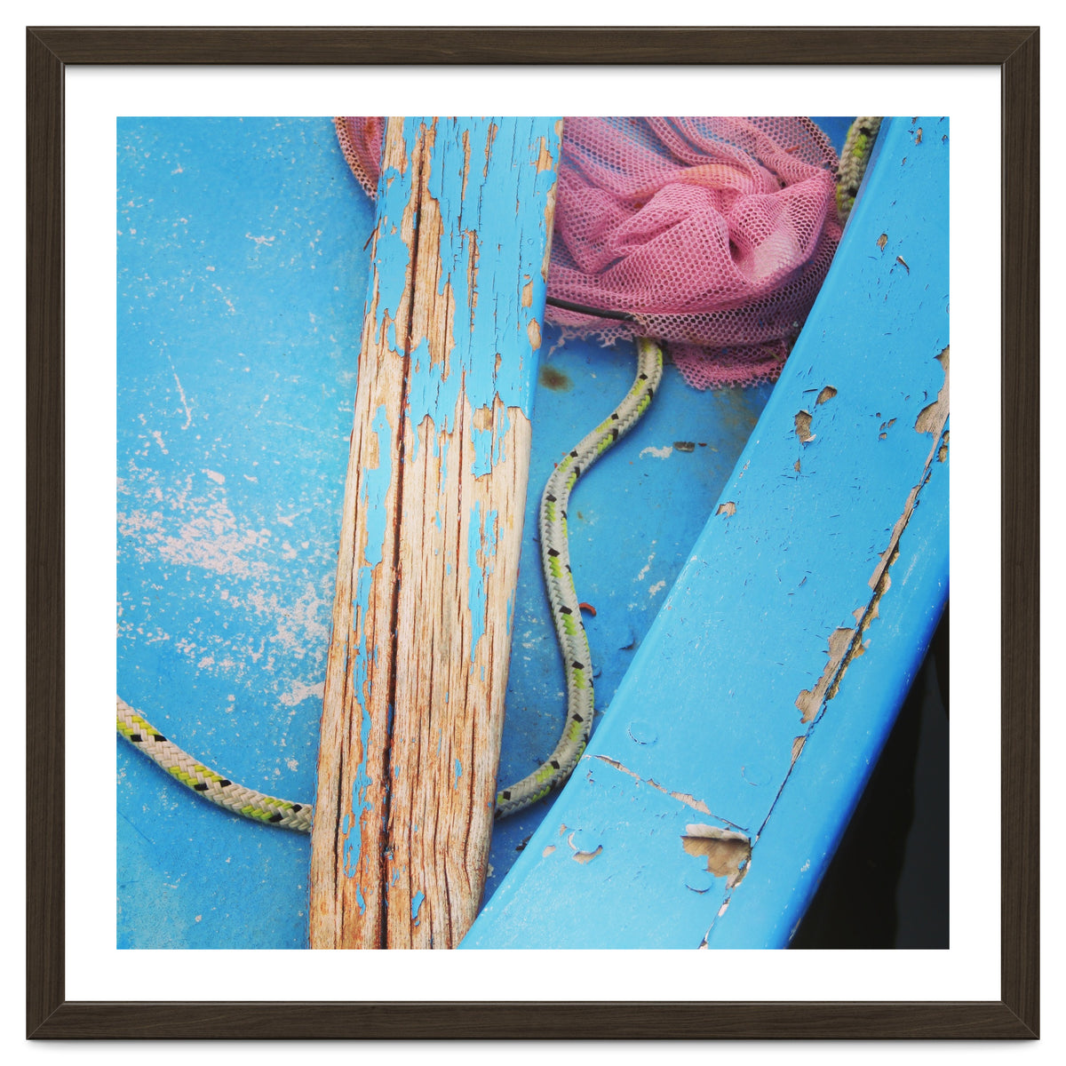 Weathered boat, sail and oar