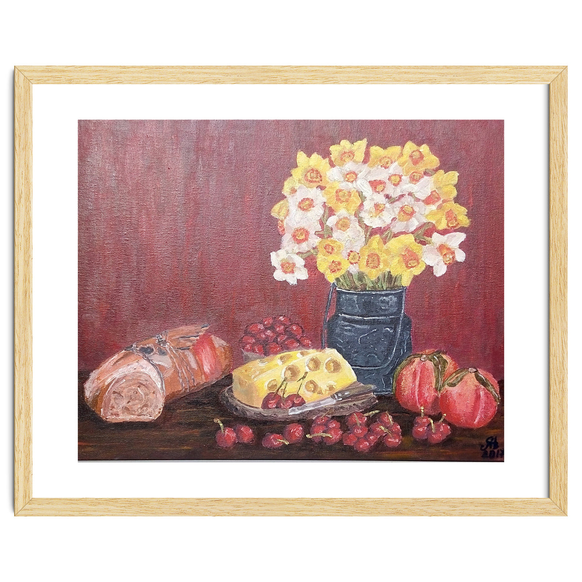Still life with cheese, daffodils on a red background.