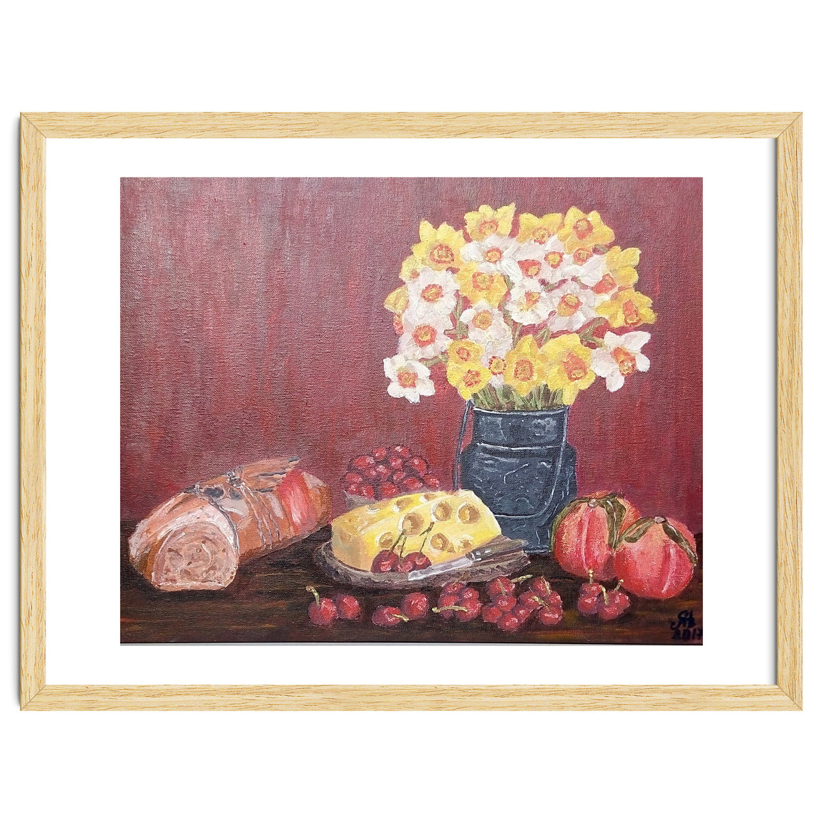 Still life with cheese, daffodils on a red background.