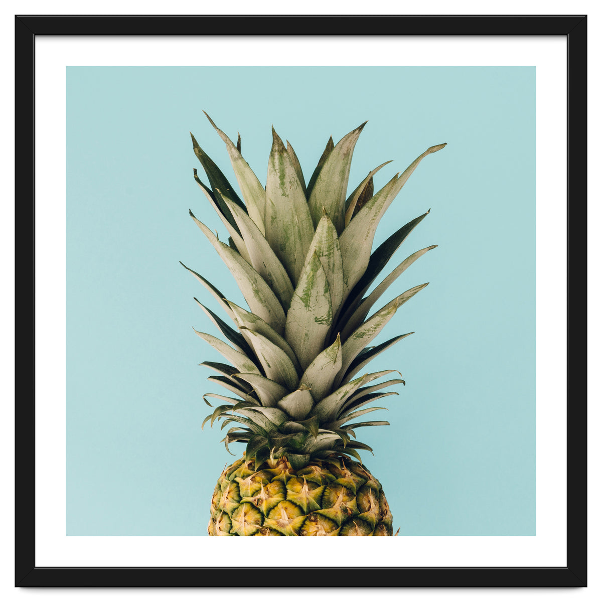 Pineapple On Blue Background