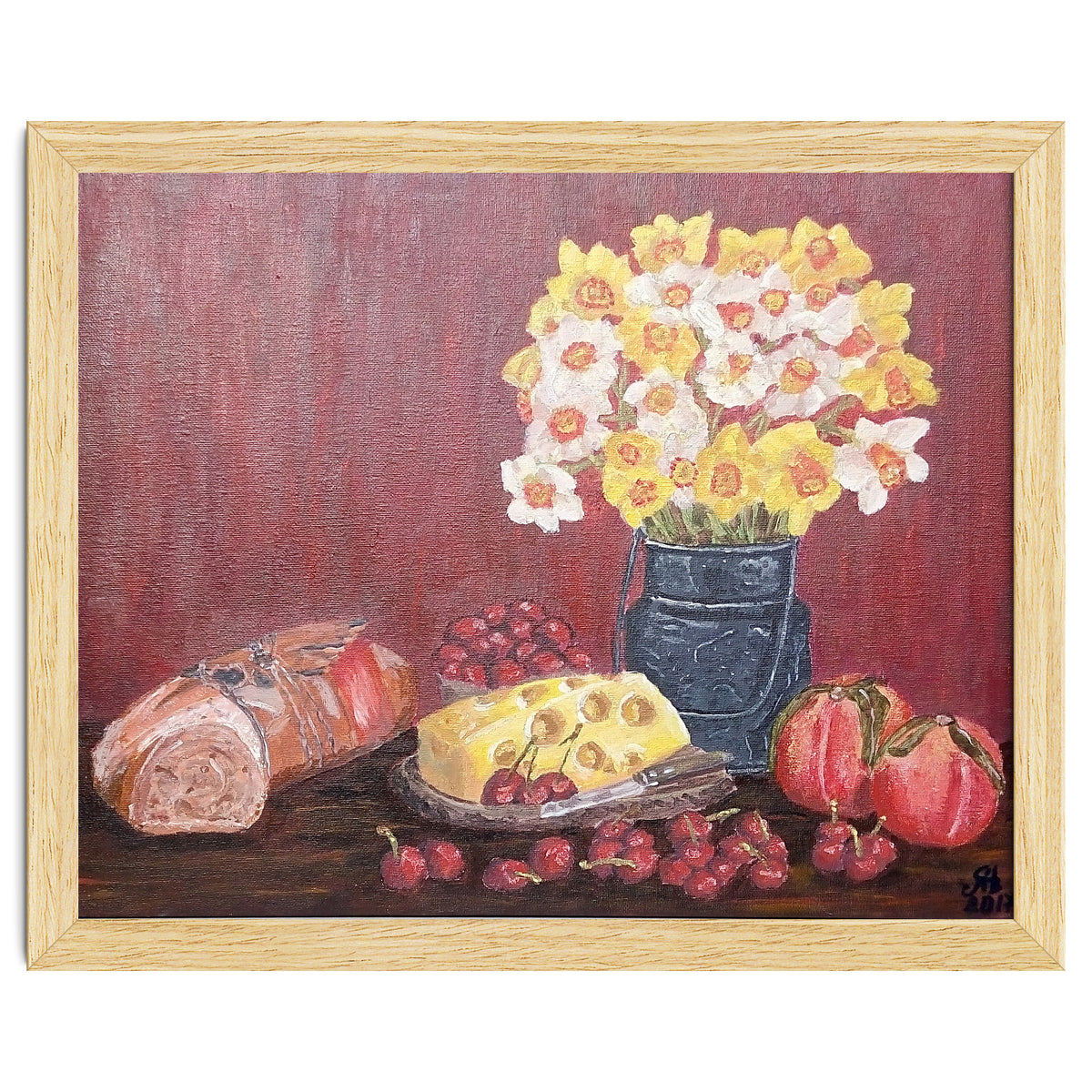 Still life with cheese, daffodils on a red background.