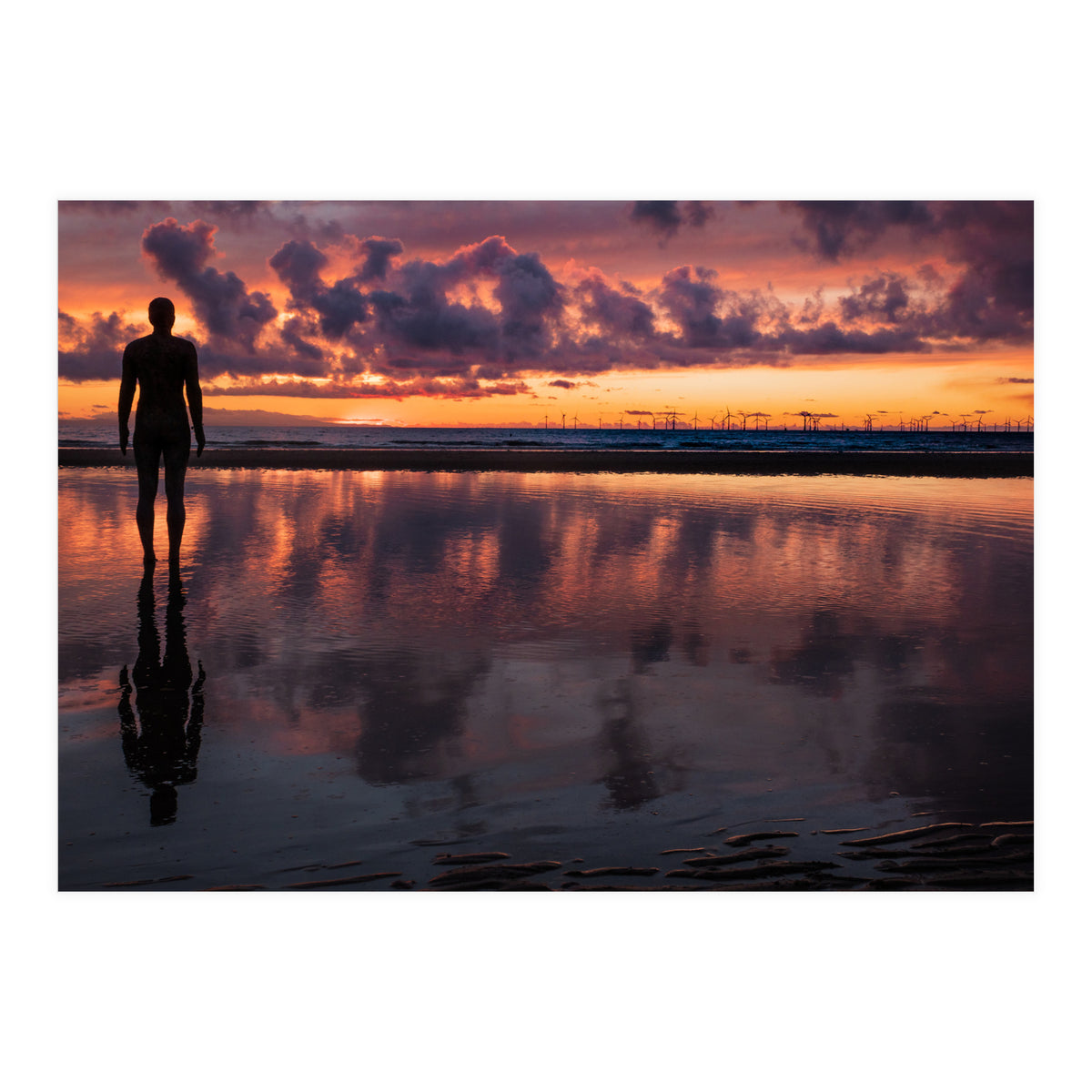 Sunset at Another Place - Sir Antony Gormley statues at Crosby Beach in Merseyside, England.  (Print Only)